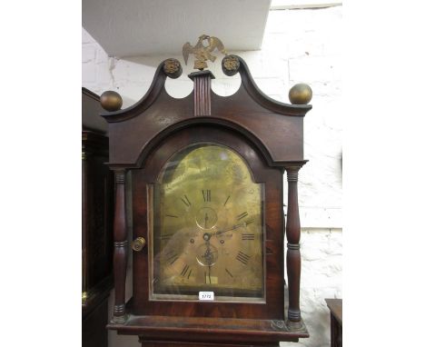 19th Century mahogany longcase clock having broken arch pediment above an arch top brass dial with Roman numerals, subsidiary