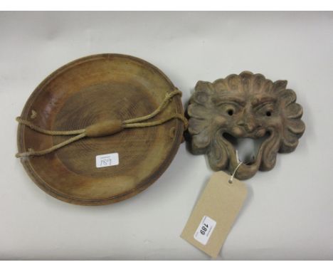 Antique terracotta lion mask wall bracket together with an oriental wooden bowl with string handle