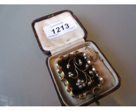 Victorian black enamel seed pearl and yellow metal mounted memorial brooch