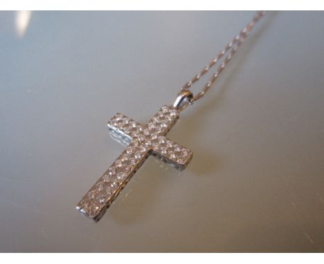 18ct White gold pendant cross set forty six brilliant cut diamonds, approximate total weight 1.38ct, suspended on a 9ct white