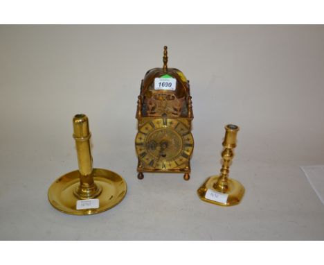 Small brass lantern clock with quartz movement and two brass candlesticks