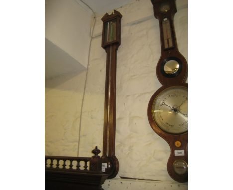 Reproduction mahogany and line inlaid stick barometer in George III style, together with a mahogany cased aneroid barometer