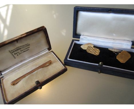 Cased pair of 9ct gold cufflinks together with a cased tie clip