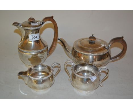 20th Century London silver four piece tea service of baluster form with gadroon rim