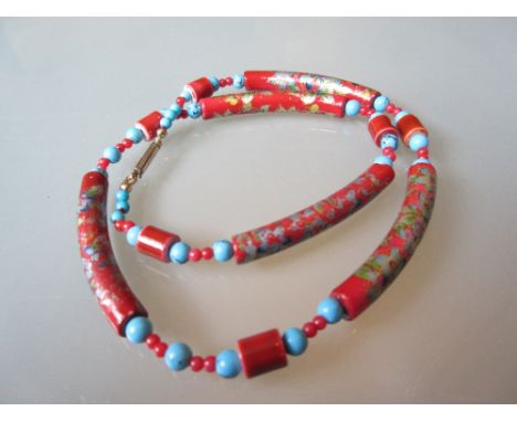 Turquoise coral and enamel decorated porcelain necklet