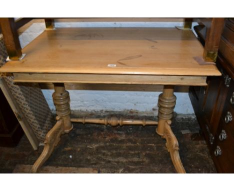 Reproduction Victorian style rectangular polished pine centre table on turned centre column with carved scroll legs with a tu