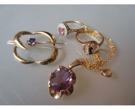 Two yellow gold diamond and stone set dress rings, gold amethyst set pendant on chain and a gold amethyst set brooch