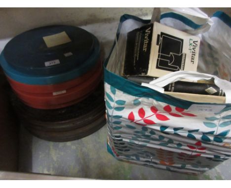 Small quantity of various film reels in plastic and tin containers including empty cases, bag containing a quantity of film r