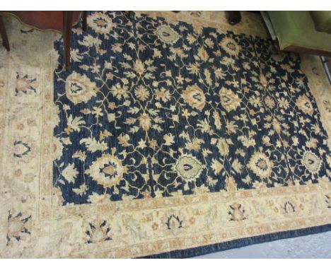 Late 20th Century Afghan Zeigler carpet with an all-over stylised floral design on a blue ground with ivory borders, 8ft x 6f