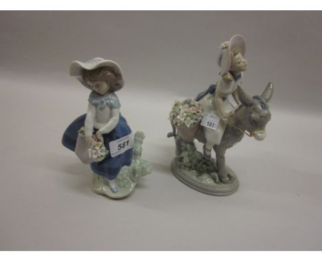 Lladro figure of a girl riding a donkey, together with another of a girl carrying a basket of flowers