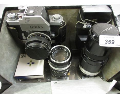 Nikon F camera outfit including four Nikkor lenses and other accessories, camera serial number 6889562