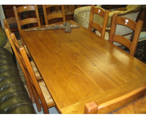 20th Century light oak refectory style draw-leaf dining table on baluster turned supports with H stretcher, 36ins x 72ins clo