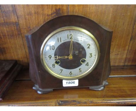 Bakelite cased two train mantel clock, similar oak cased clock and a mahogany cased three train mantel clock