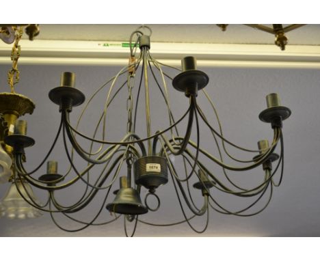 Large patinated metal eight branch chandelier together with a pair of matching wall lights