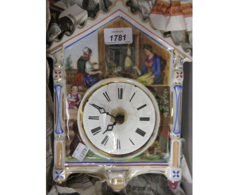 19th Century German porcelain wall clock decorated with figures in interiors with circular enamel dial (a/f) and a Schotlenwe