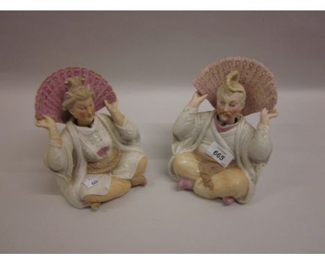 Pair of large 19th Century Continental bisque nodding head figures of seated orientals with fan form collars (some restoratio