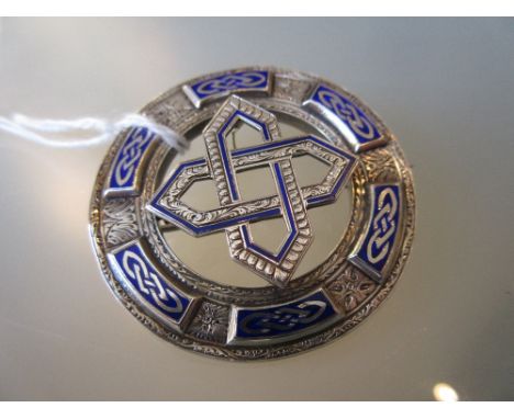 Victorian circular silver enamel decorated Celtic design brooch