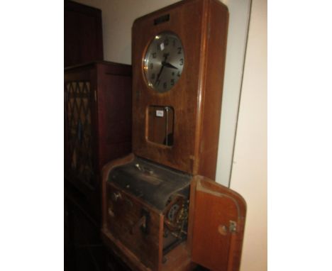 German oak cased Isgus two train time recorder clock with circular silvered dial and Arabic numerals