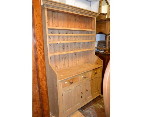 19th Century stripped pine dresser with a boarded shelf back above two drawers with two cupboard doors below