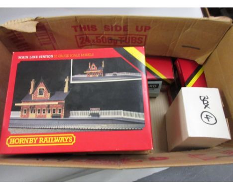 Box containing a quantity of Hornby 00 gauge scale model buildings in original boxes and a 01 master control unit in original