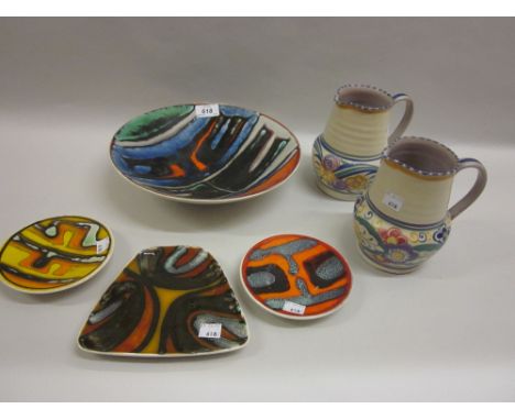 Poole Pottery Aegean pattern dish, three similar smaller dishes and two Poole Pottery floral decorated jugs