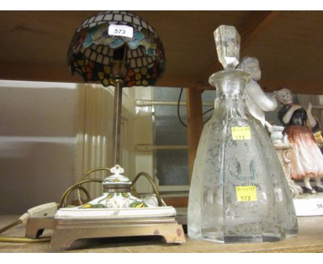 Etched glass decanter with stopper, together with a brass table lamp with leaded glass shade and porcelain inkwell mounted to