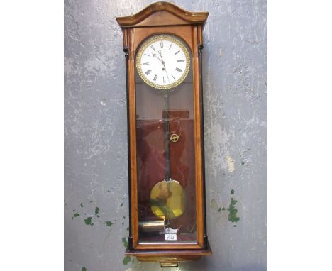 19th Century beechwood and part ebonised Vienna regulator clock with an enamel dial, Roman numerals and single train weight d