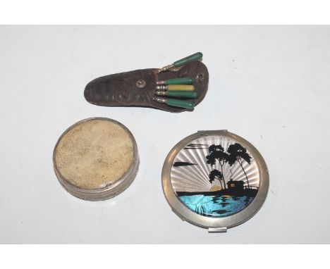 A vintage silver and shagreen compact; another chrome and enamelled compact; a Bakelite nailcare kit 