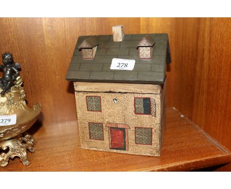 A tea caddy in the form of a house 