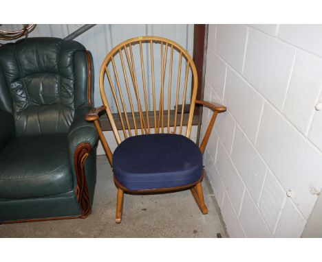 An Ercol stick rocking chair 