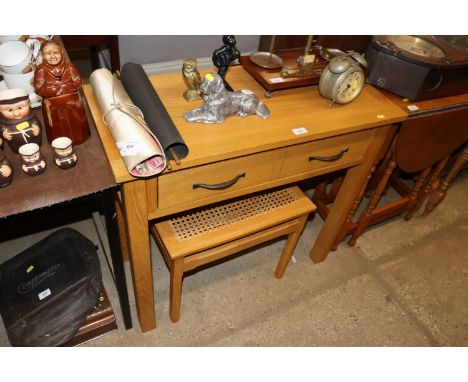 A light oak hall table fitted single drawer and a cane seated dressing table stool