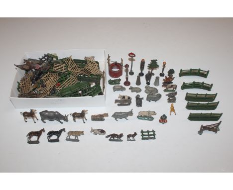 Two boxes containing a quantity of vintage metal farm animals