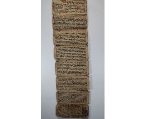 Early Nepalese Double-Sided Manuscript Book. In Newari on paper. Unfolded, the manuscript measures 38 x 11 inches.