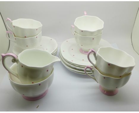 A six setting Bell china tea service, six cups, saucers, side plates, sugar and cream 