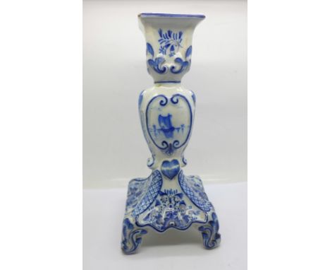 A blue and white candlestick, a/f, 25cm 