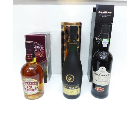 A bottle of Graham's vintage port, Chivas Scotch whisky and Remy Martin Champagne Cognac