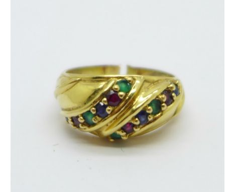 A yellow metal ring set with sapphire, ruby and emerald, shank a/f 