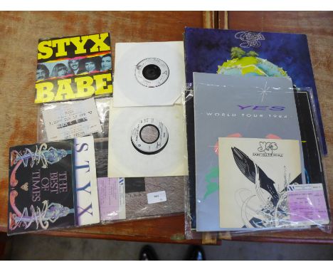 A collection of Heavy Metal, five 7" singles, tour programmes and ticket stubs, Rush, Yes 