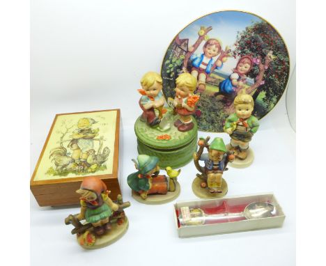 Two Hummel musical boxes, a Hummel plate, four Hummel figures and a Hummell collectors spoon 