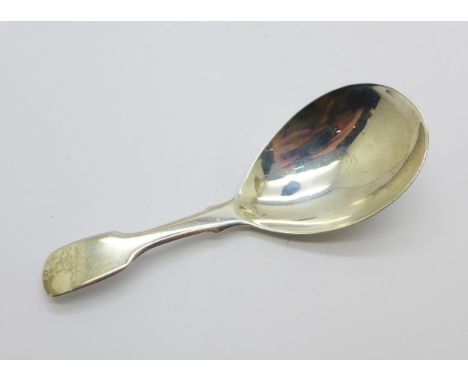 A silver caddy spoon, London 1821 