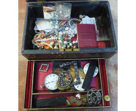 A vintage jewellery box with contents including pocket watch, cut steel buckles, medallions, etc. 