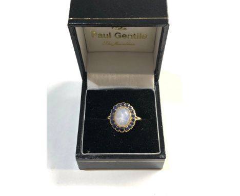 18ct Gold star sapphire halo ring, approx weight 2.5g ring size m/n, Good overall condition, no stones missing, unhallmarked,