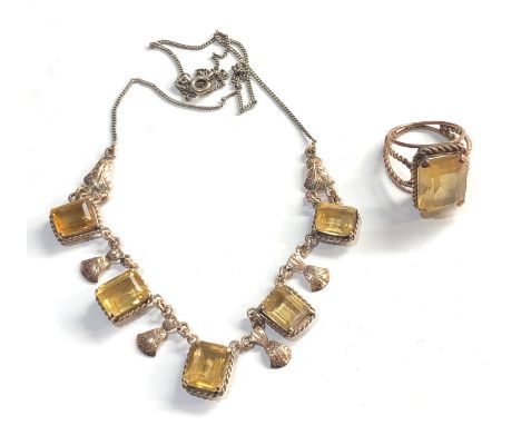9ct gold yellow gemstone set ring and necklace, chain on necklace white metal 