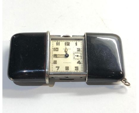 Black enamel Movado Ermeto purse watch in good overall condition edge chips to enamel 