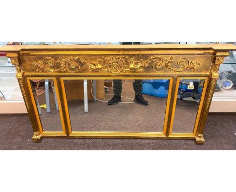 Fancy ornate gilt framed mirror measures approx 55ins by 30ins 