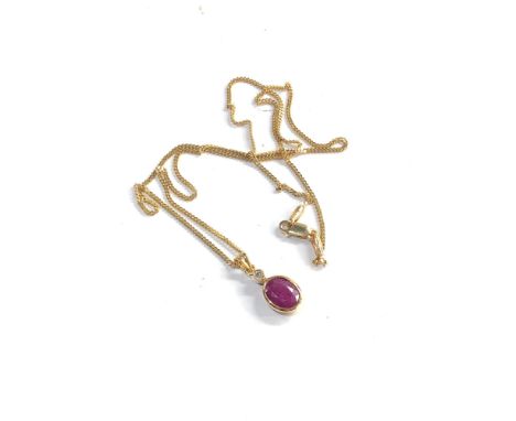 14ct gold chain and 18ct gold and ruby diamond pendant 