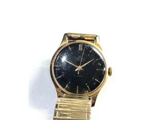 Vintage black dial smiths de luxe 17 jewel gents wrist watch winds and ticks but no warranty given 