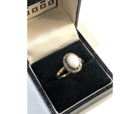 18ct Gold opal diamond ring, Good overall condition, no stones missing Weight approx 4.3g size approx Q/R, stone approximate 