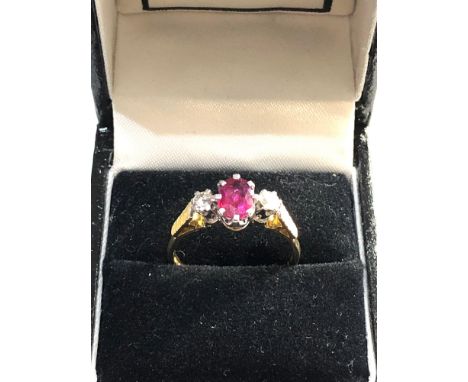 18ct gold diamond &amp; ruby ring, ring size approx q/r,&nbsp;overall condition central stone measures approximately 7mm by 5