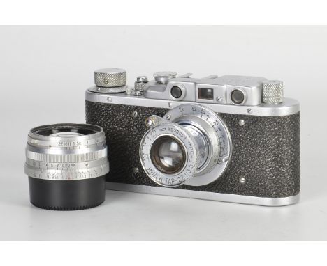 A FED Zorki Rangefinder Camera, chrome, serial no. 02916, with Mockba Industar-22 f/3.5 50mm lens, chrome, serial no. 90911, 